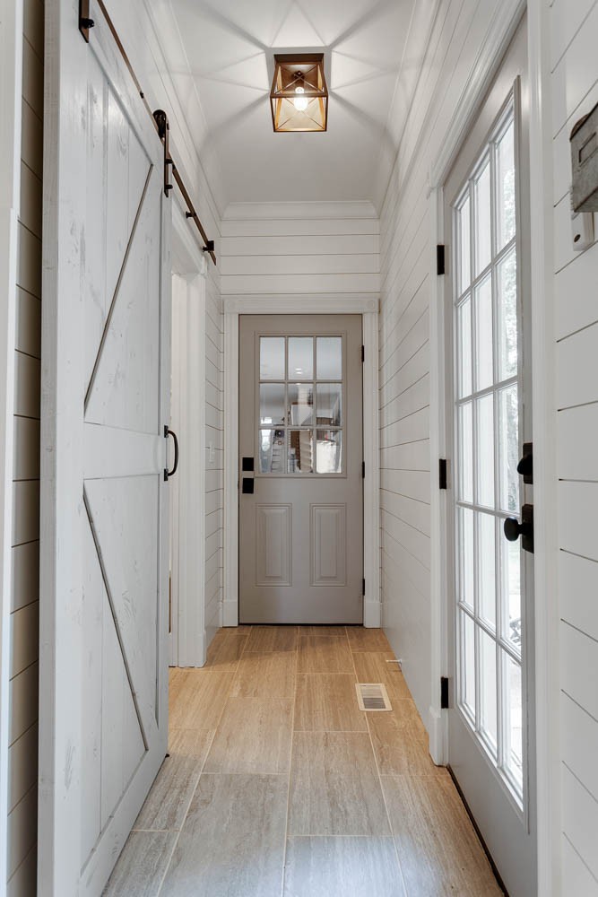 1479 Ridley Drive Franklin, TN 37064 - Photo 20 of 40 a view of a hallway with wooden floor and staircase