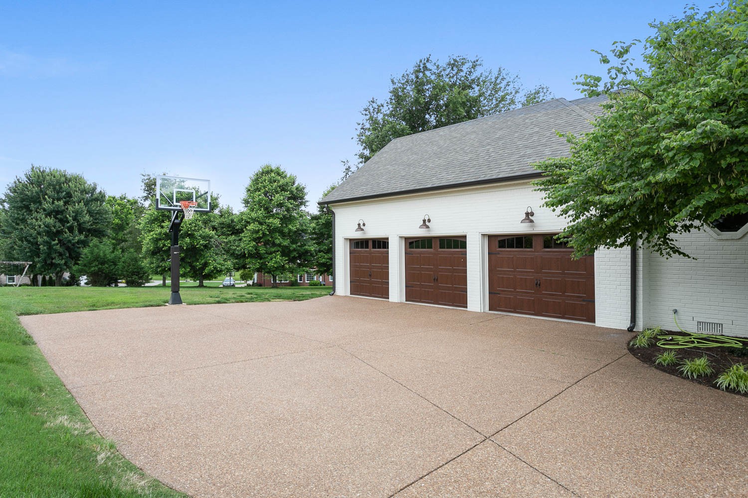 1479 Ridley Drive Franklin, TN 37064 - Photo 37 of 40 a view of a house with a yard and potted plants