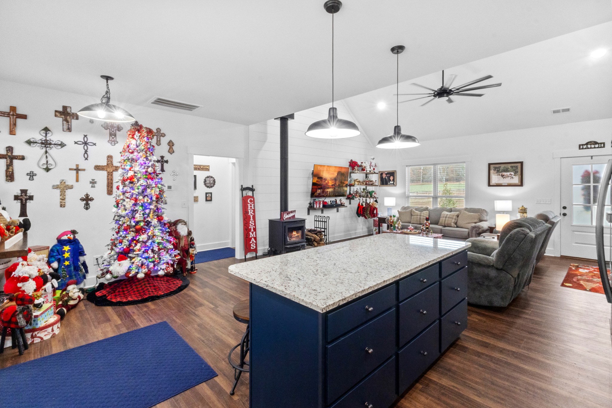 249 Claypool Road Bethpage, TN 37022 - Photo 14 of 53 a room with lots of wooden furniture and a chandelier