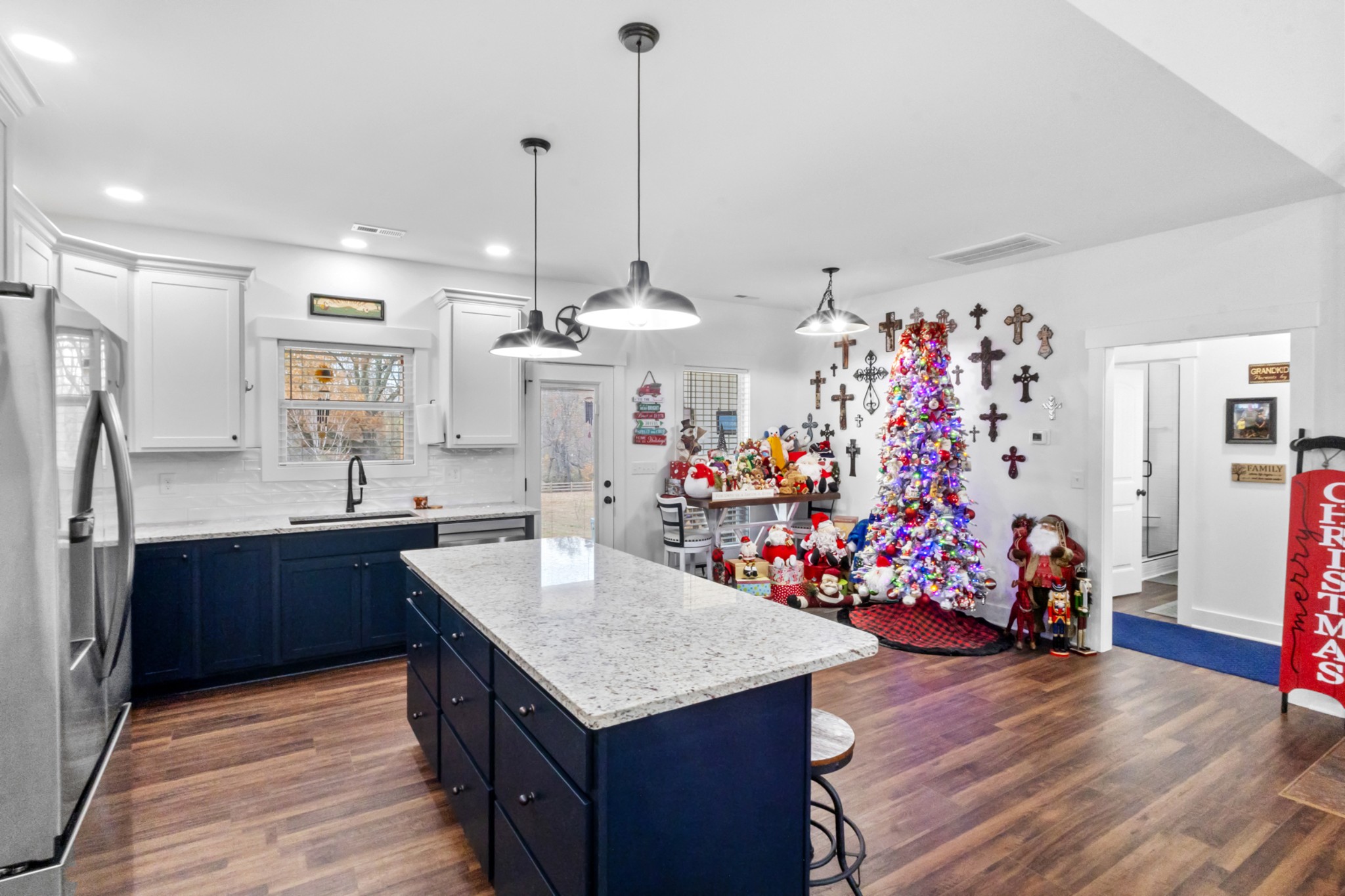 249 Claypool Road Bethpage, TN 37022 - Photo 15 of 53 a kitchen with granite countertop a table and chairs