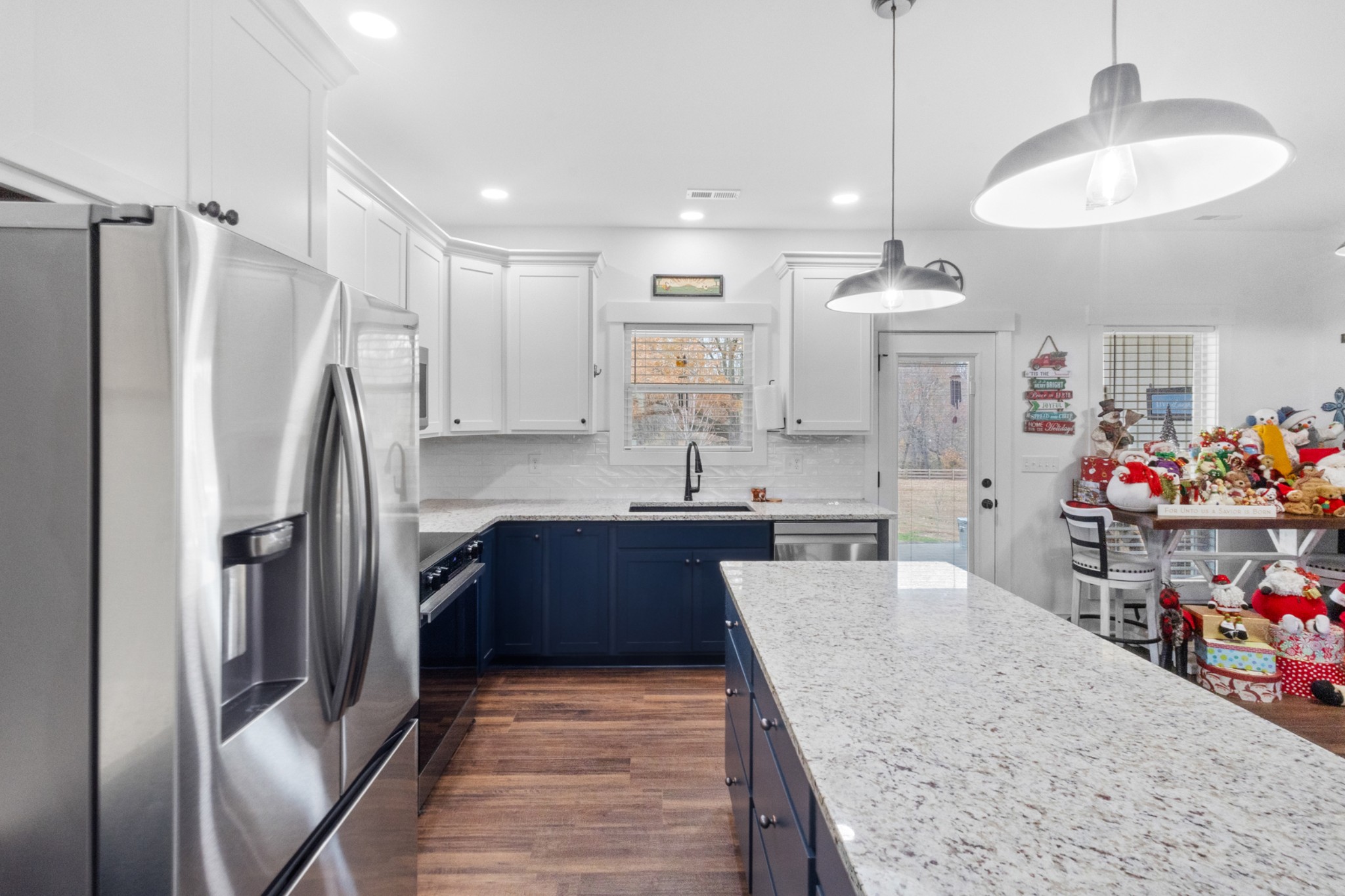 249 Claypool Road Bethpage, TN 37022 - Photo 16 of 53 a open kitchen with stainless steel appliances granite countertop a refrigerator and a sink