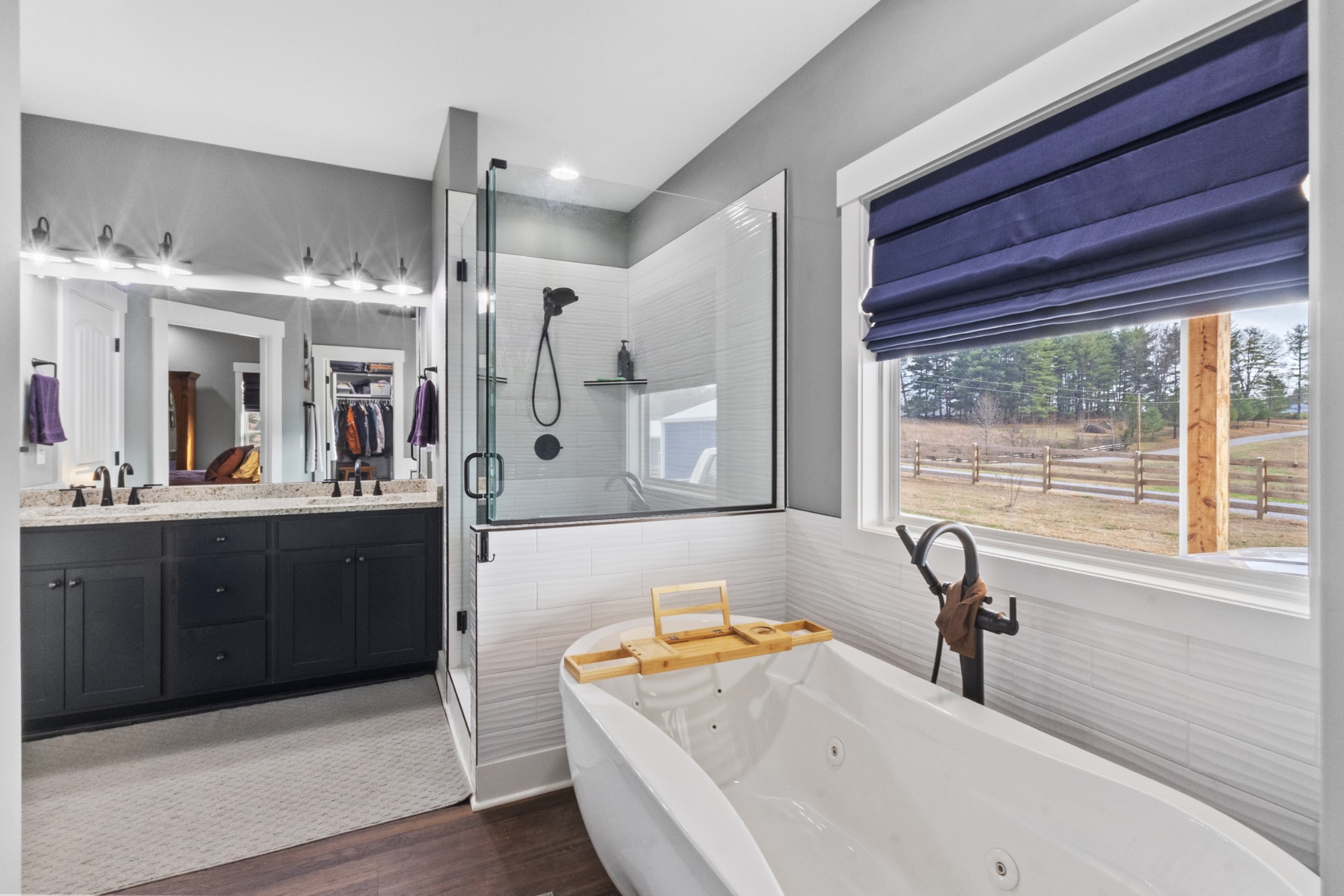 249 Claypool Road Bethpage, TN 37022 - Photo 23 of 53 a bathroom with a tub sink and mirror
