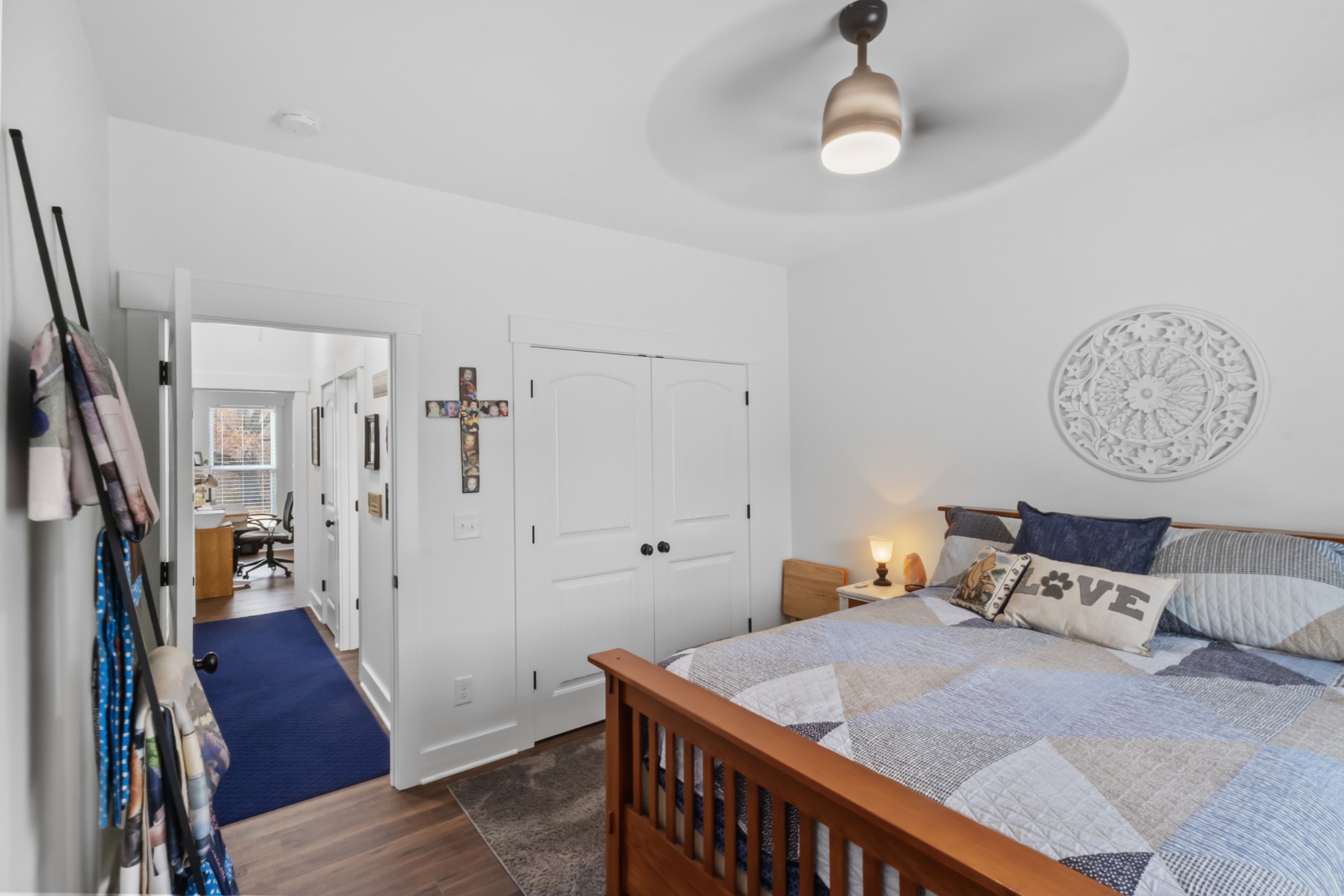 249 Claypool Road Bethpage, TN 37022 - Photo 31 of 53 a bed room with a bed and a chandelier