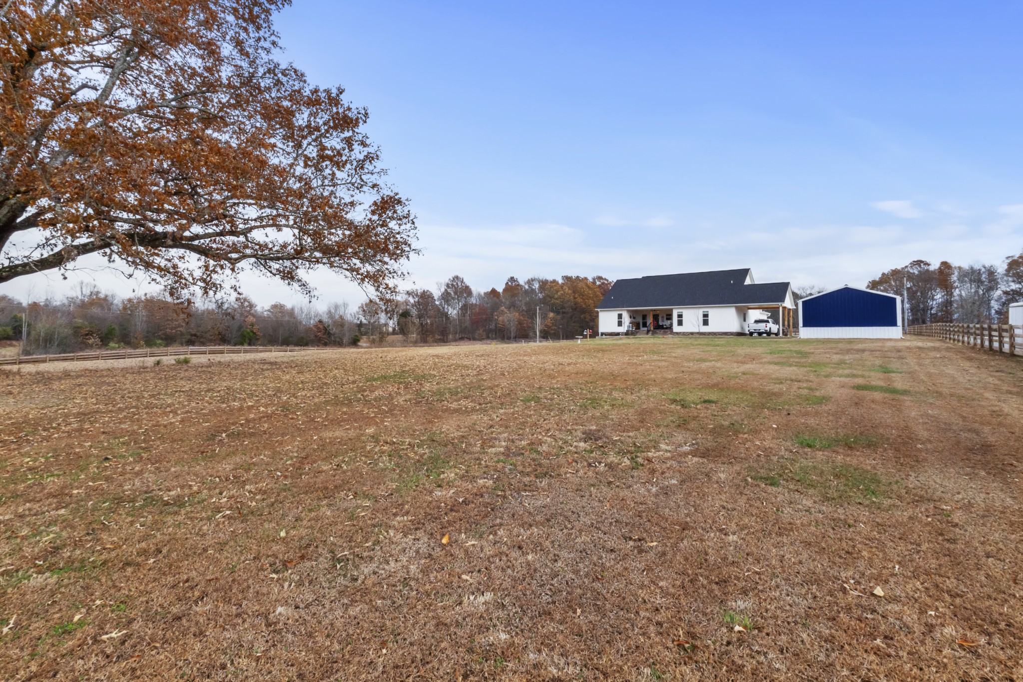 249 Claypool Road Bethpage, TN 37022 - Photo 40 of 53 a view of a big yard with plants and large trees