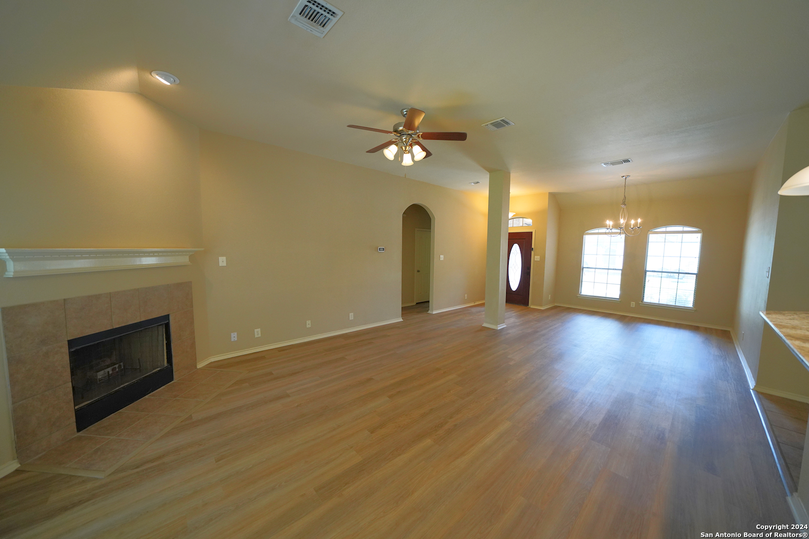 15805 Fair Lane Selma, TX 78154 - Photo 13 of 50 wooden floor in an empty room with a window