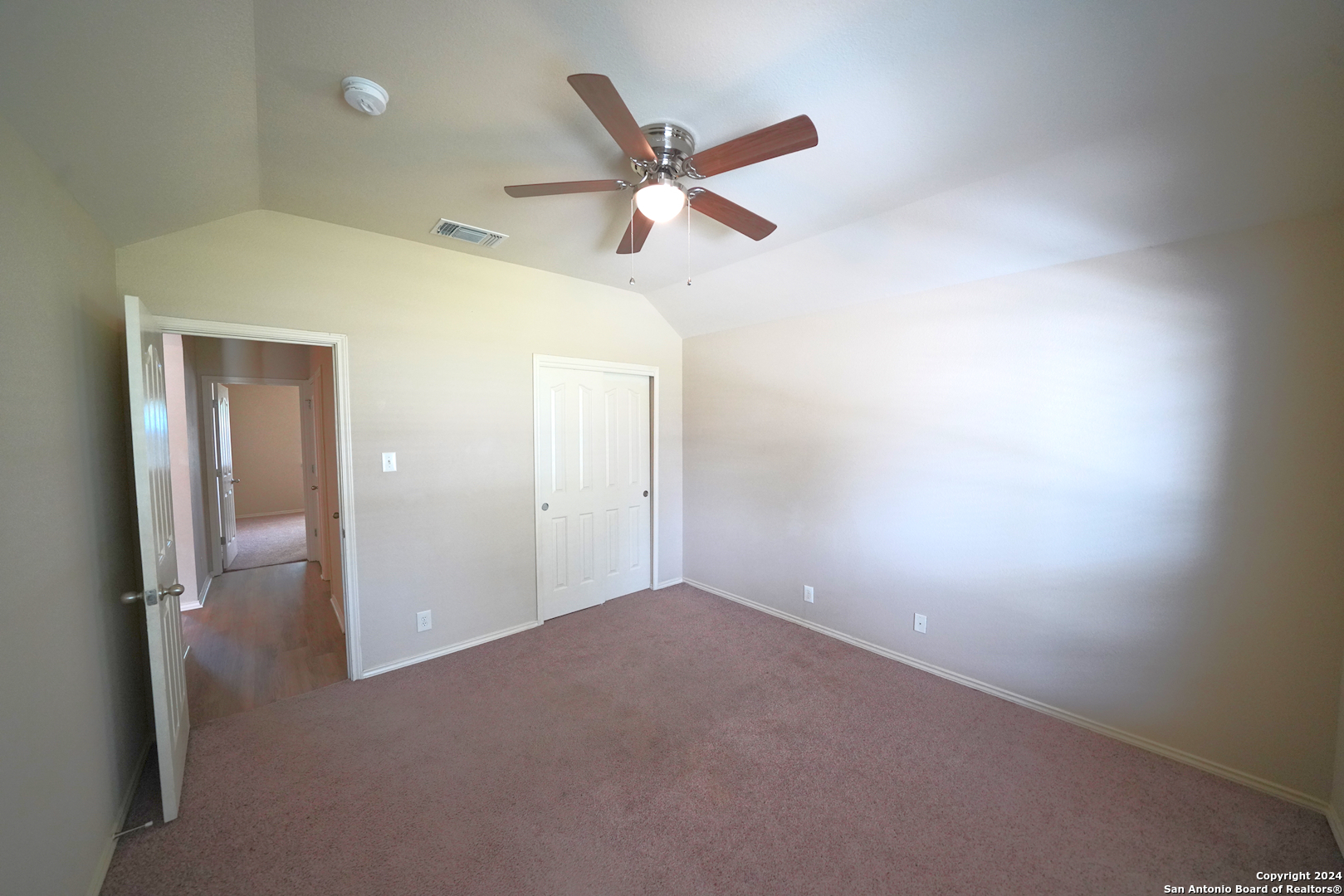 15805 Fair Lane Selma, TX 78154 - Photo 38 of 50 an empty room with closet and windows