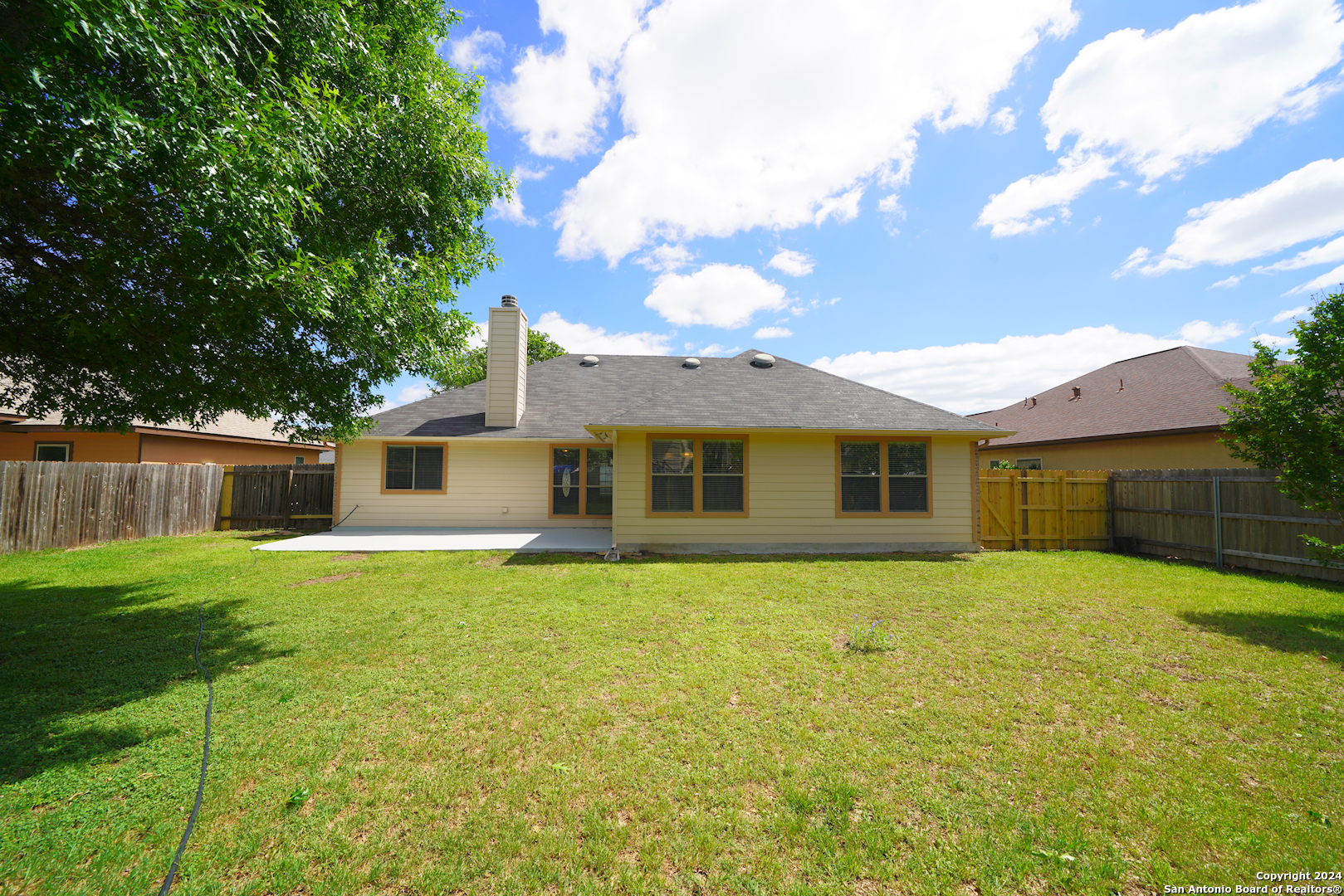 15805 Fair Lane Selma, TX 78154 - Photo 46 of 50 a front view of house with yard and trees