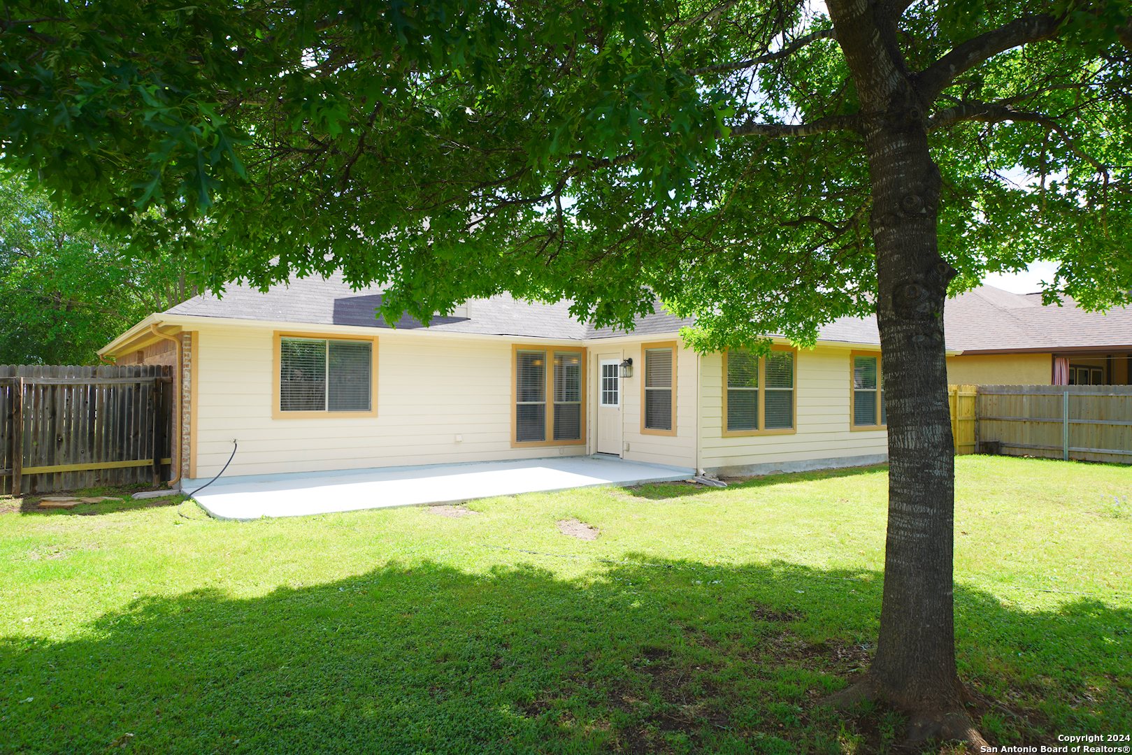 15805 Fair Lane Selma, TX 78154 - Photo 47 of 50 a view of a house with a yard and tree