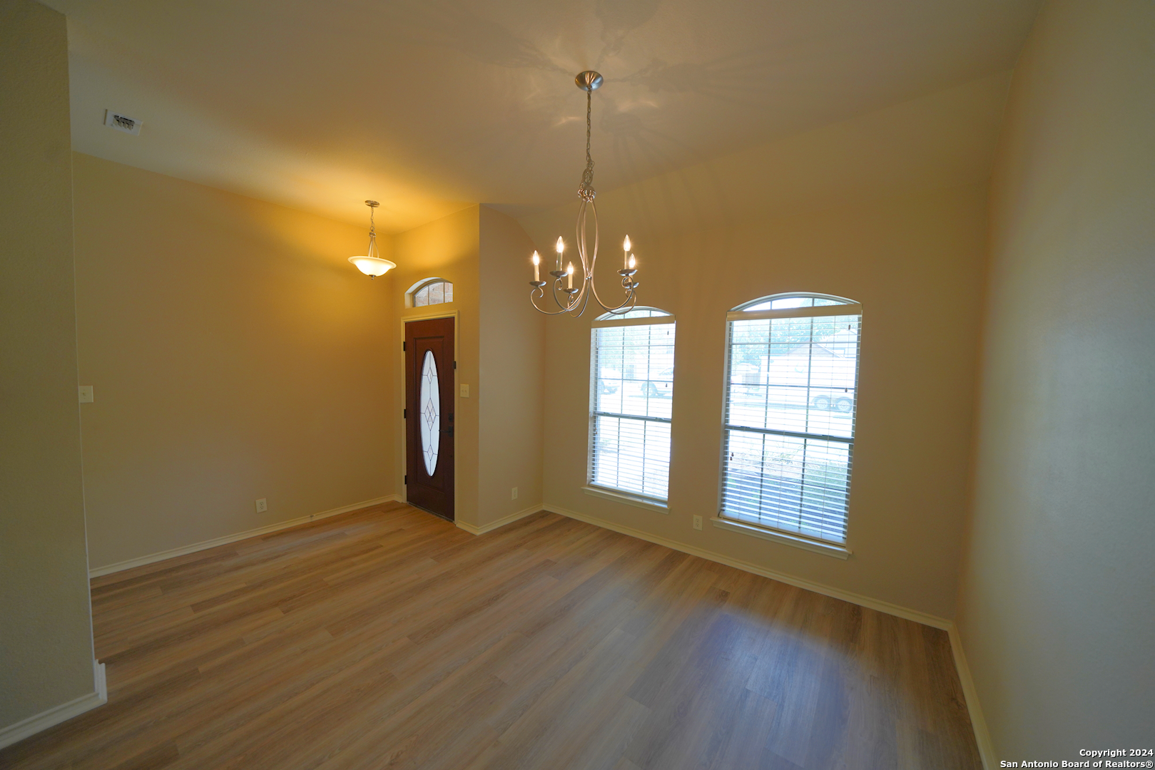 15805 Fair Lane Selma, TX 78154 - Photo 9 of 50 a view of a room with wooden floor and fan