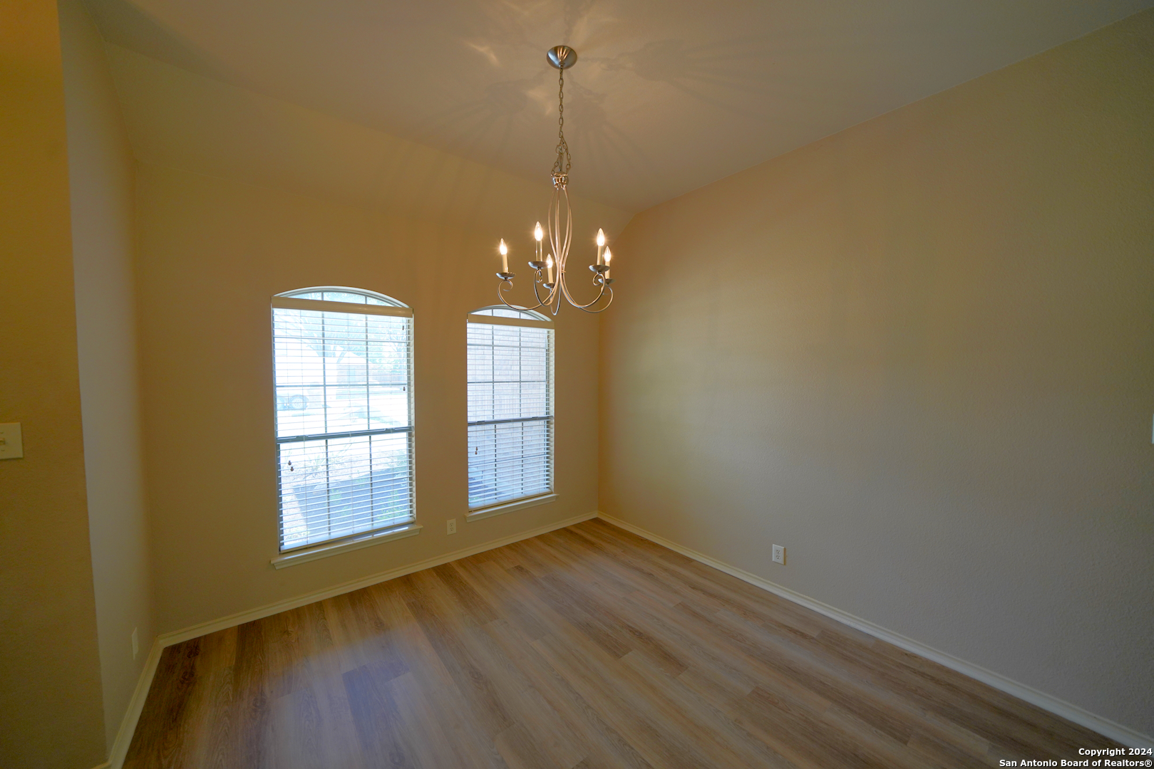 15805 Fair Lane Selma, TX 78154 - Photo 10 of 50 a view of a room with wooden floor and window