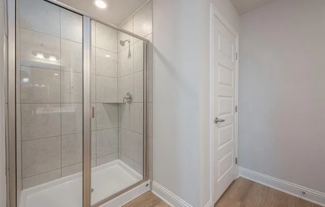 a kitchen with stainless steel appliances granite countertop sink refrigerator and microwave