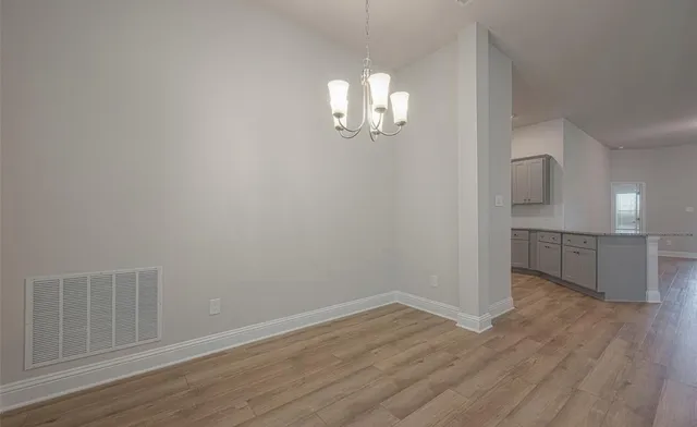 wooden floor and cabinet in a room