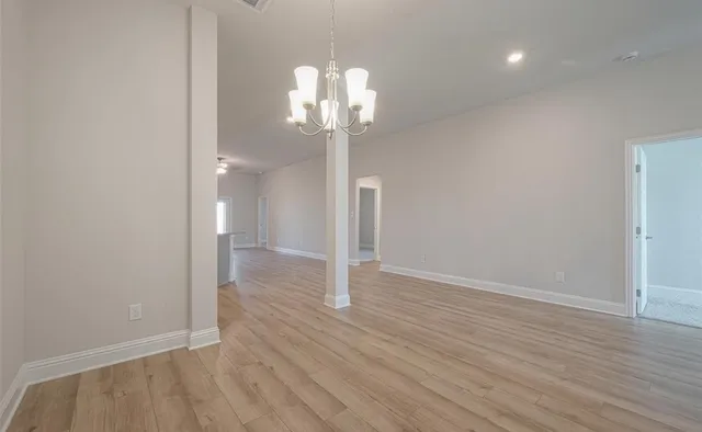 an empty room with windows