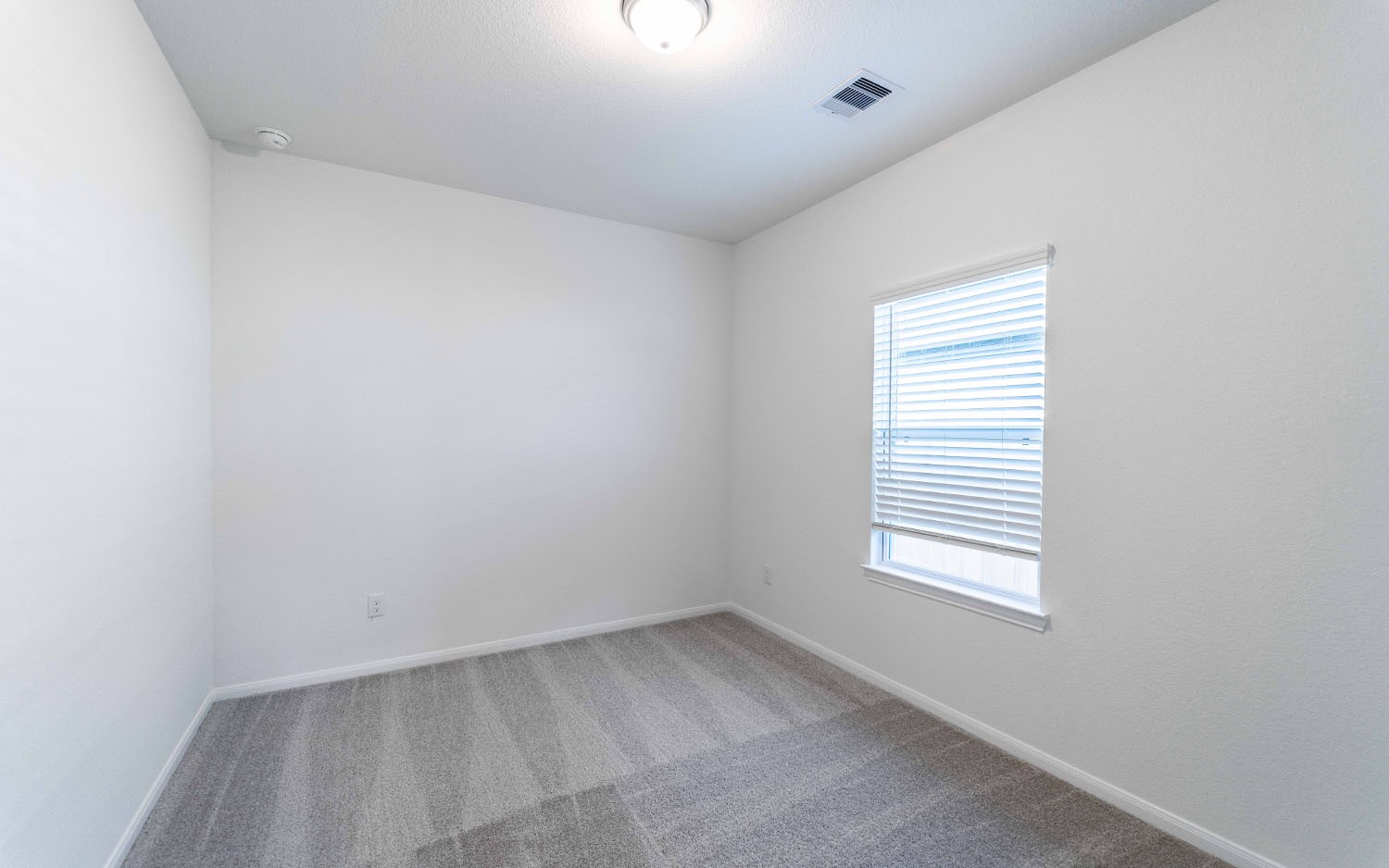 428 Monarch Trail Huntsville, TX 77340 - Photo 16 of 16 a view of an empty room with a window