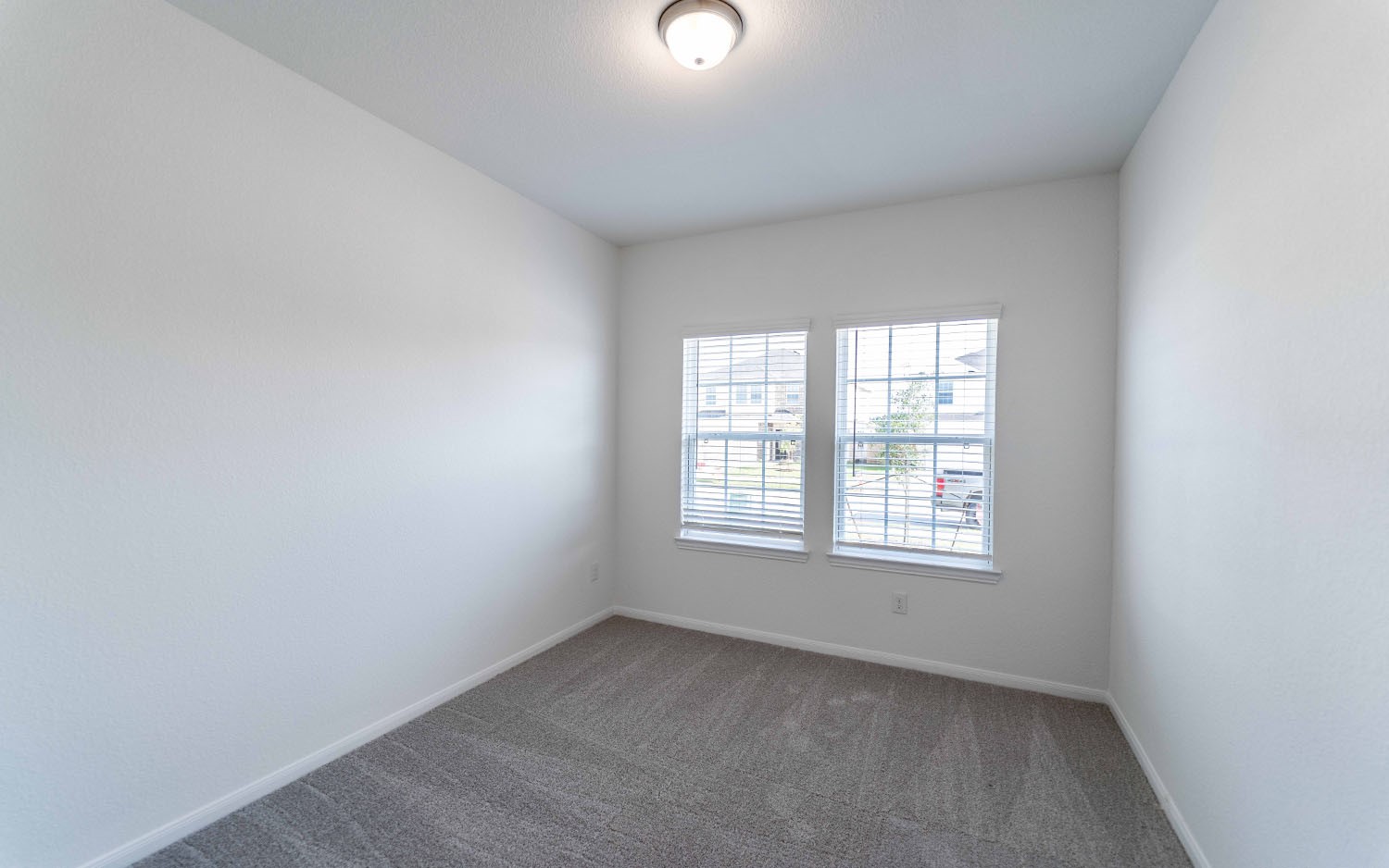 428 Monarch Trail Huntsville, TX 77340 - Photo 9 of 16 an empty room with a window