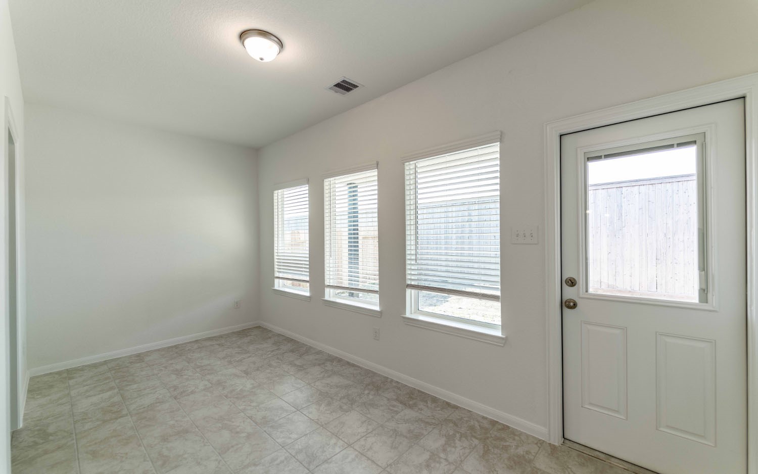 428 Monarch Trail Huntsville, TX 77340 - Photo 10 of 16 an empty room with windows