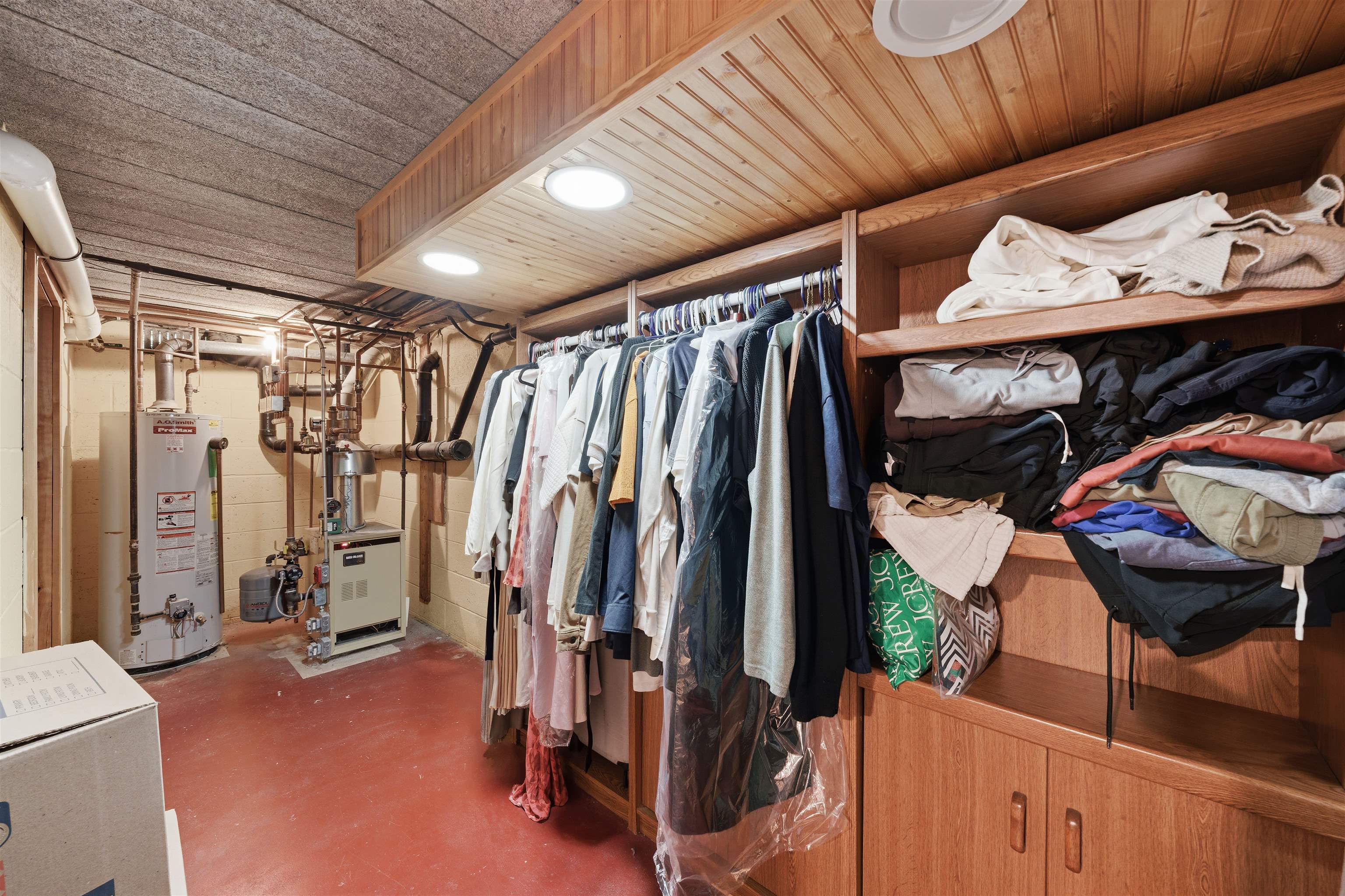 2 Carol Road Butler, NJ 07405 - Photo 39 of 49 a view of walk in closet with clothes and shoes