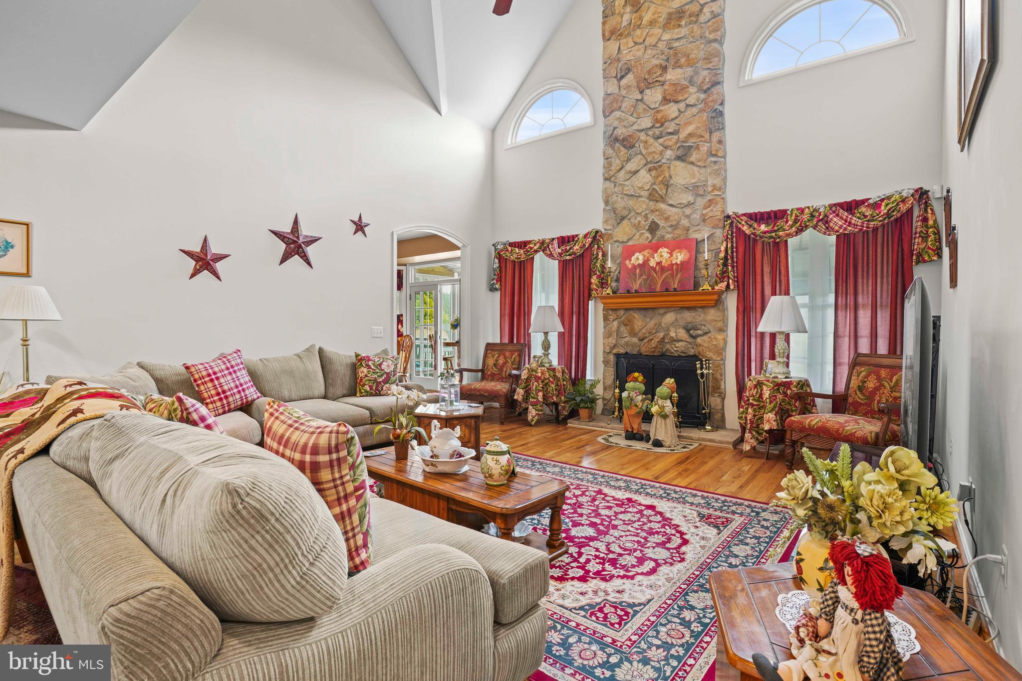 94 Friendship Road Friendship, MD 20758 - Photo 12 of 40 a living room with furniture and a fireplace