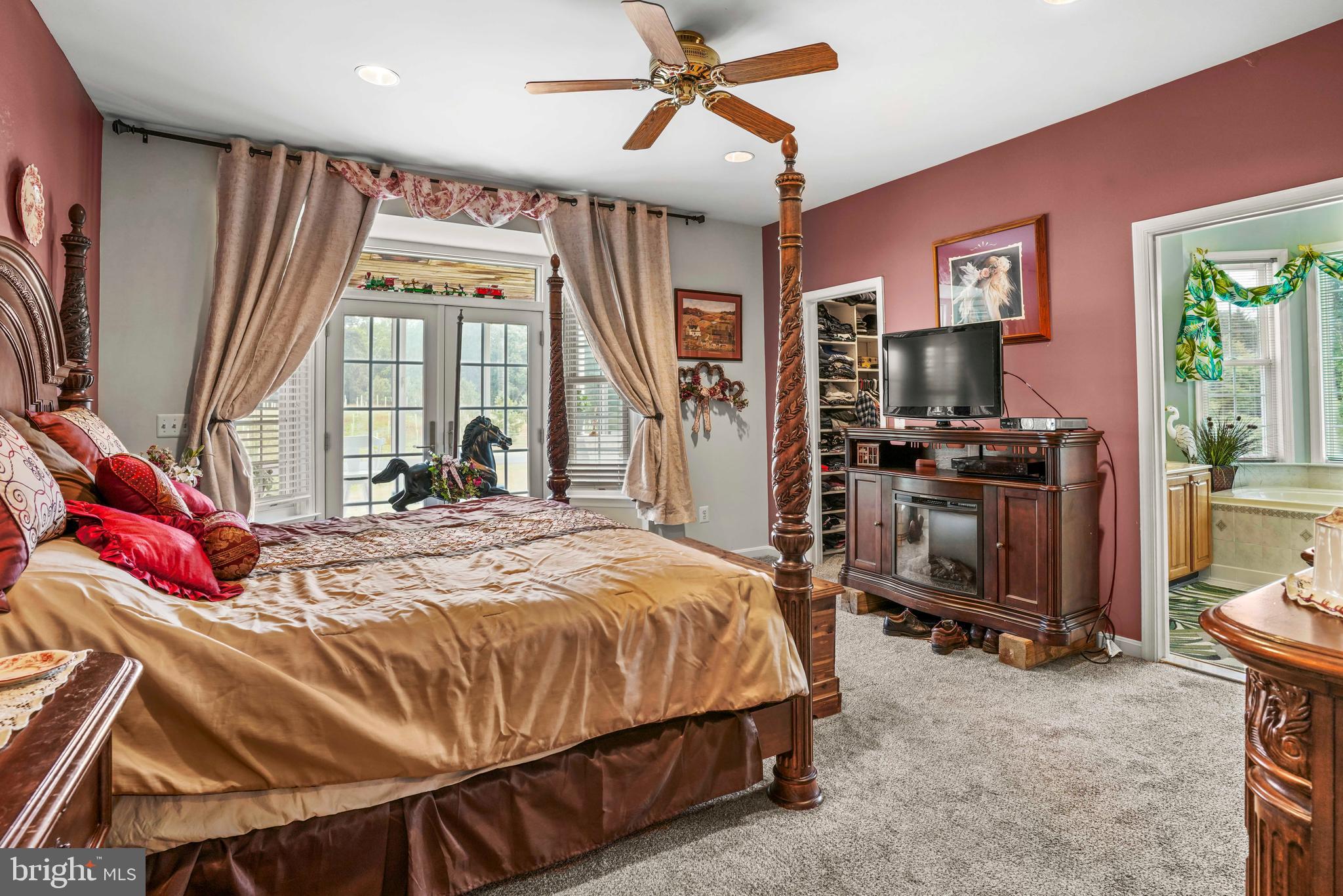 94 Friendship Road Friendship, MD 20758 - Photo 16 of 40 a bed sitting in a room next to a window