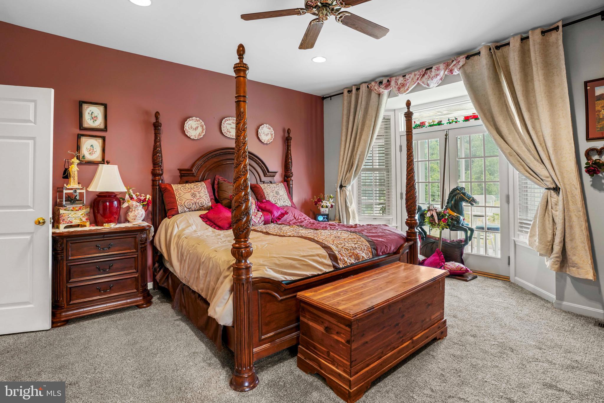 94 Friendship Road Friendship, MD 20758 - Photo 17 of 40 a bed sitting in a room next to a window