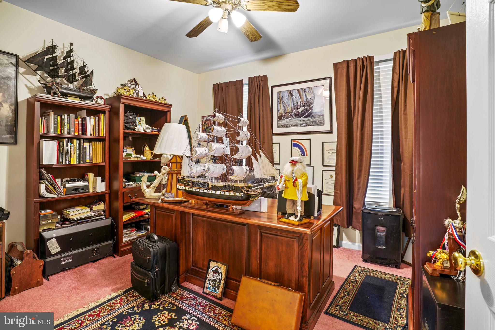 94 Friendship Road Friendship, MD 20758 - Photo 24 of 40 a view of a workspace with furniture and toys