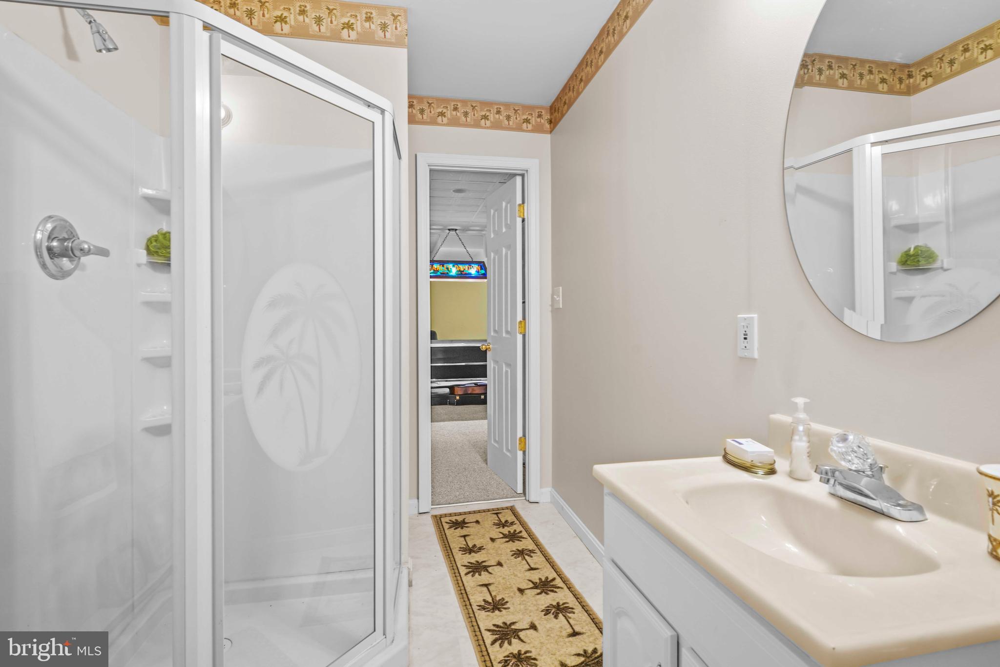 94 Friendship Road Friendship, MD 20758 - Photo 30 of 40 a bathroom with a sink and a mirror