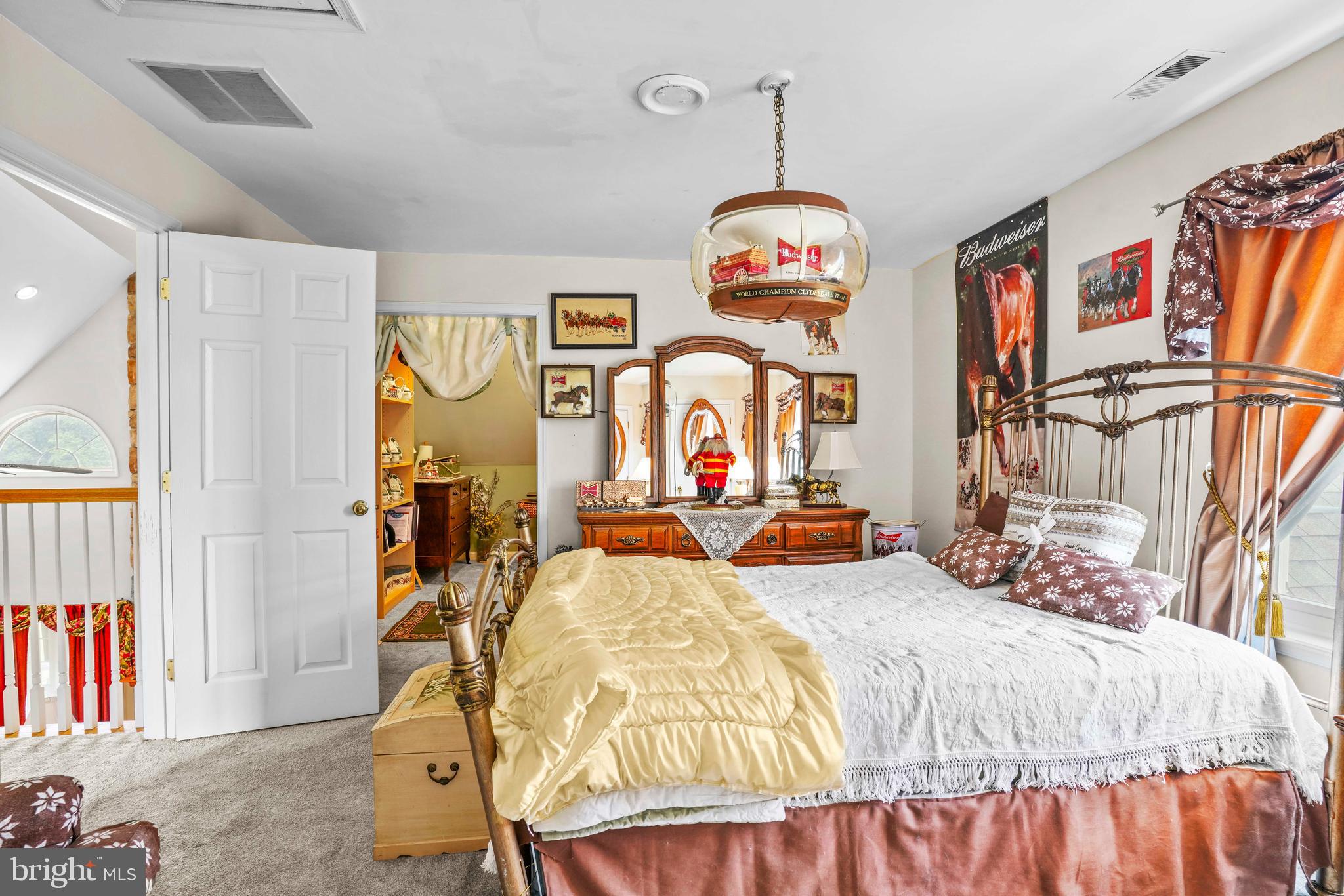 94 Friendship Road Friendship, MD 20758 - Photo 32 of 40 a bed room with a bed mirror and a window