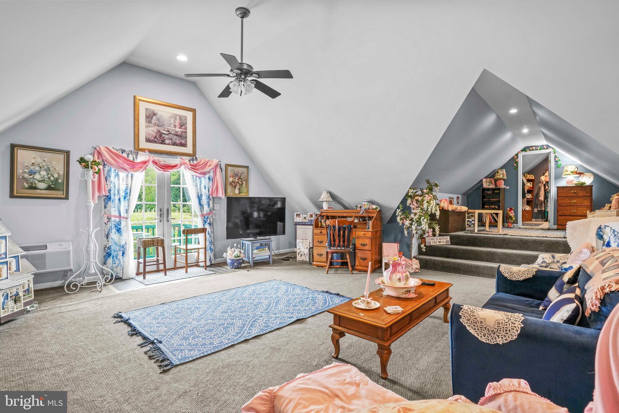 94 Friendship Road Friendship, MD 20758 - Photo 39 of 40 a living room with furniture a flat screen tv and a large window