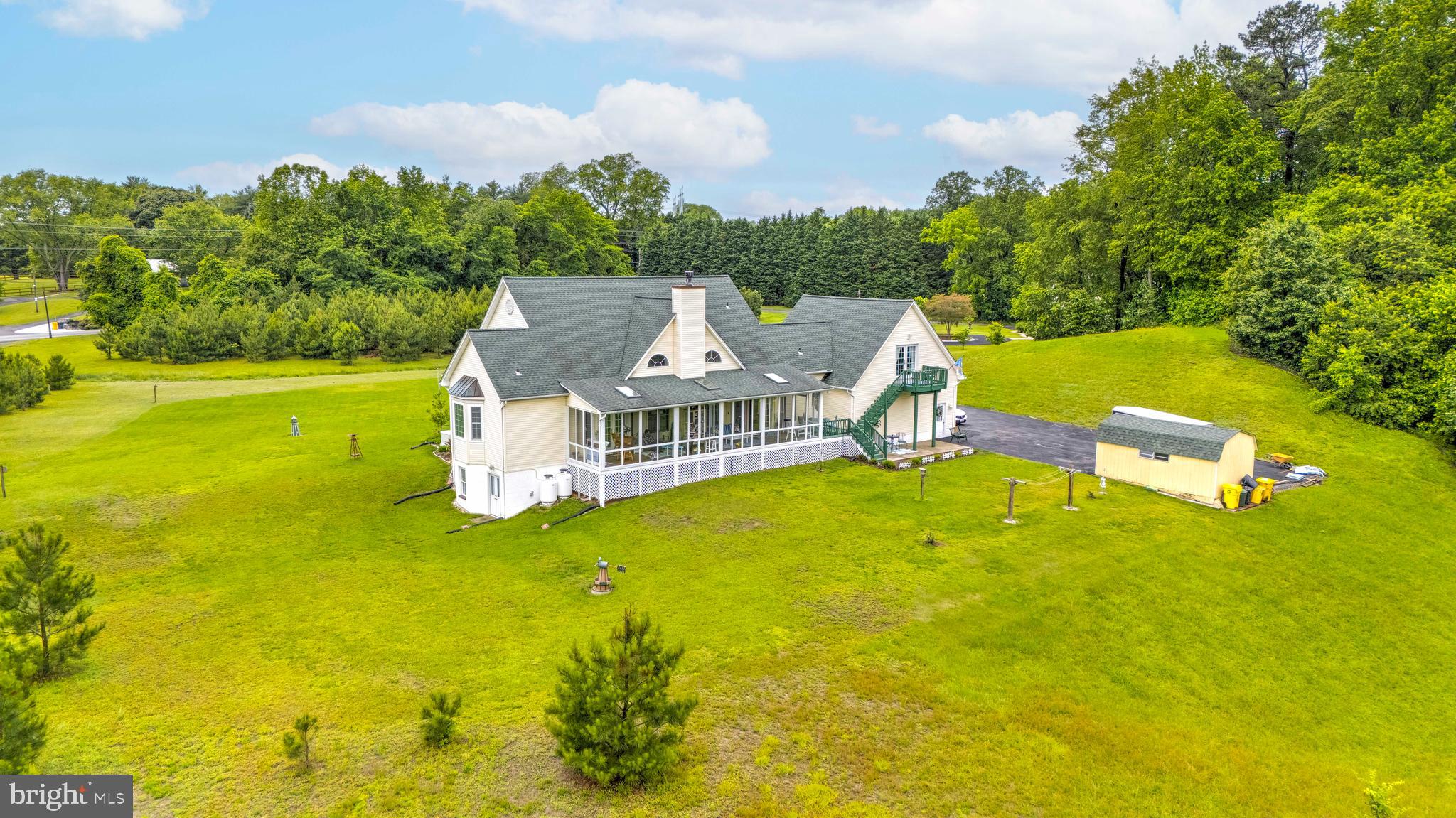 94 Friendship Road Friendship, MD 20758 - Photo 4 of 40 a view of a house with a big yard