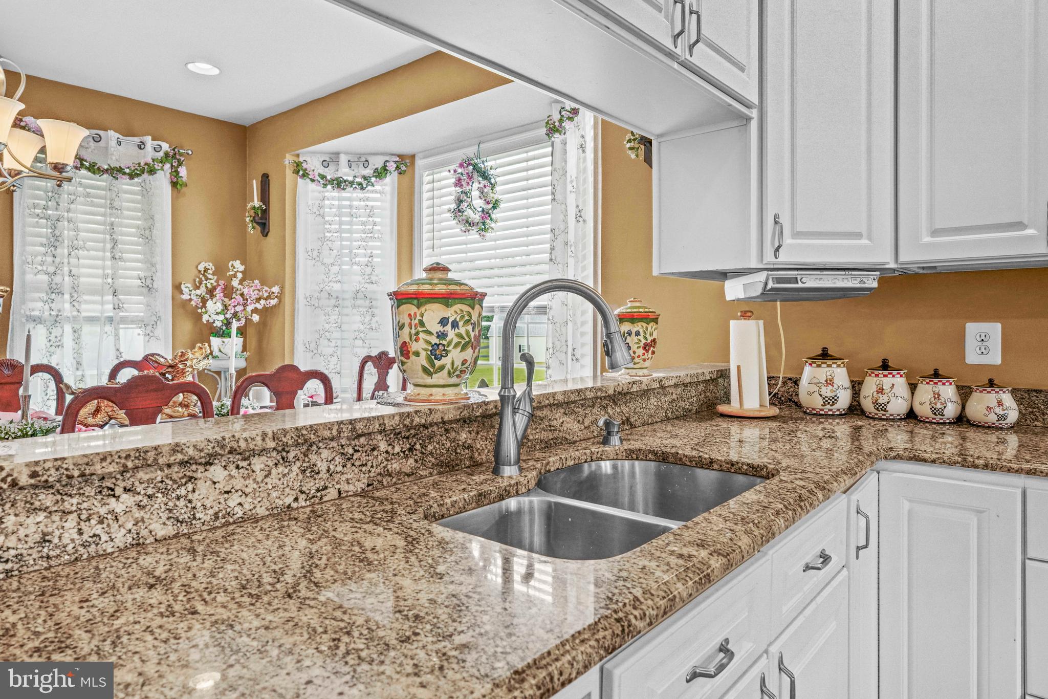 94 Friendship Road Friendship, MD 20758 - Photo 8 of 40 a kitchen with stainless steel appliances granite countertop a sink a stove and cabinets