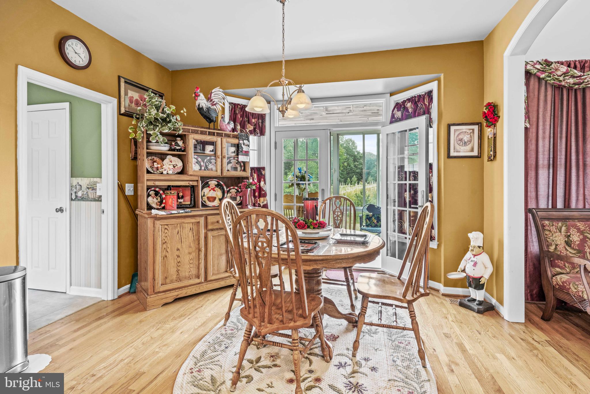 94 Friendship Road Friendship, MD 20758 - Photo 9 of 40 a view of a dining room with furniture and a window