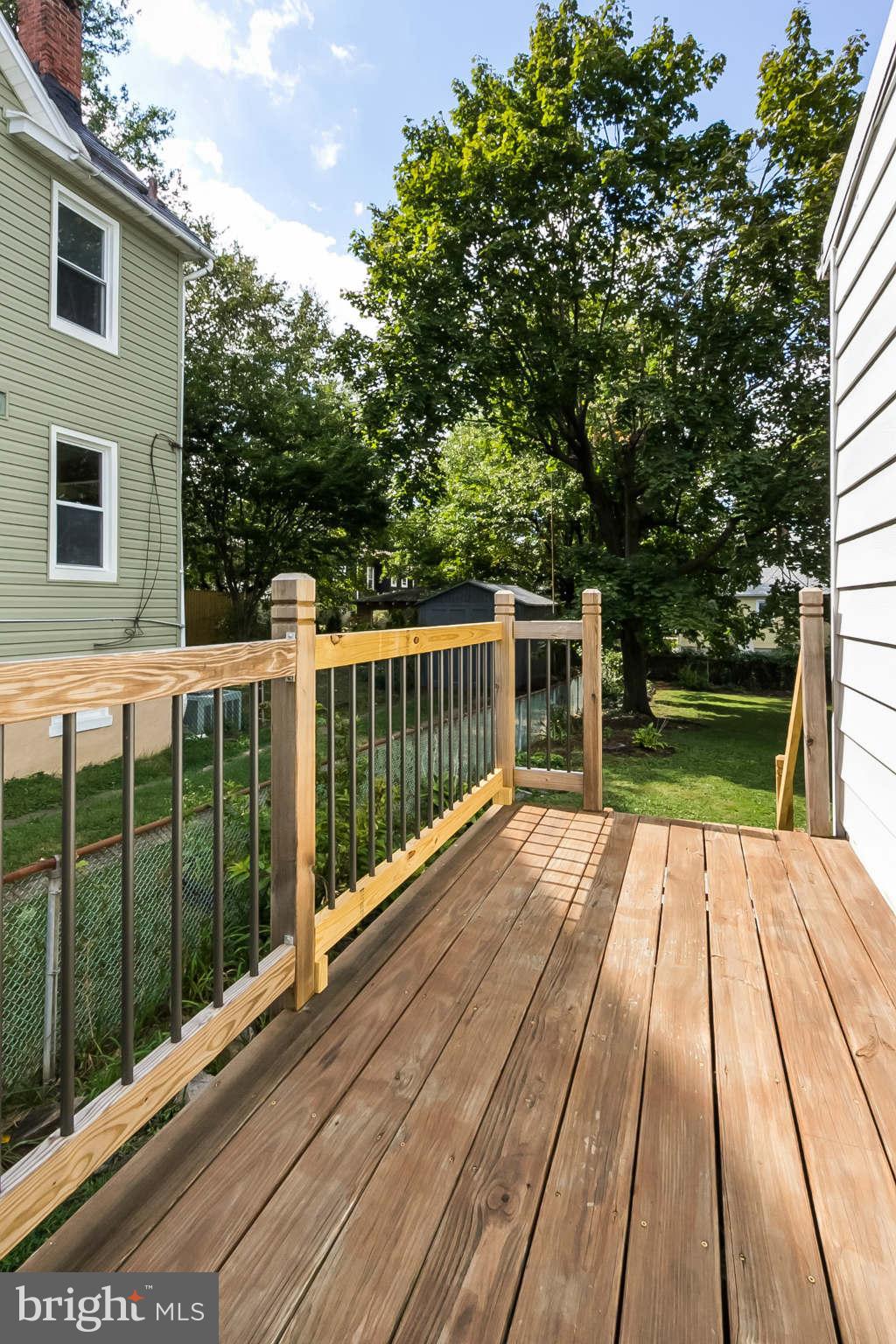 5506 Tramore Road Baltimore, MD 21214 - Photo 24 of 30 a view of backyard with a deck