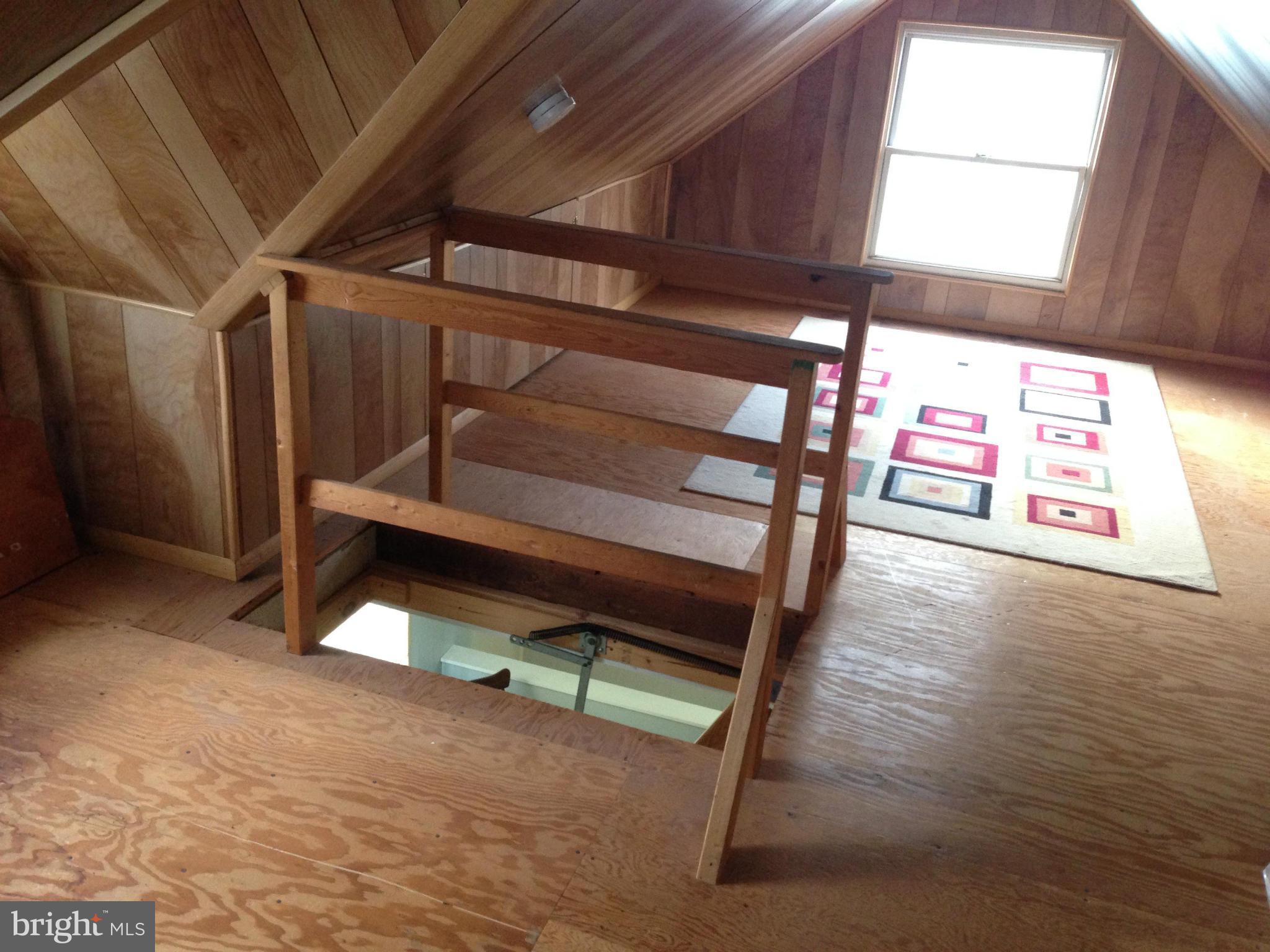 5506 Tramore Road Baltimore, MD 21214 - Photo 29 of 30 a wooden bench sitting in a room