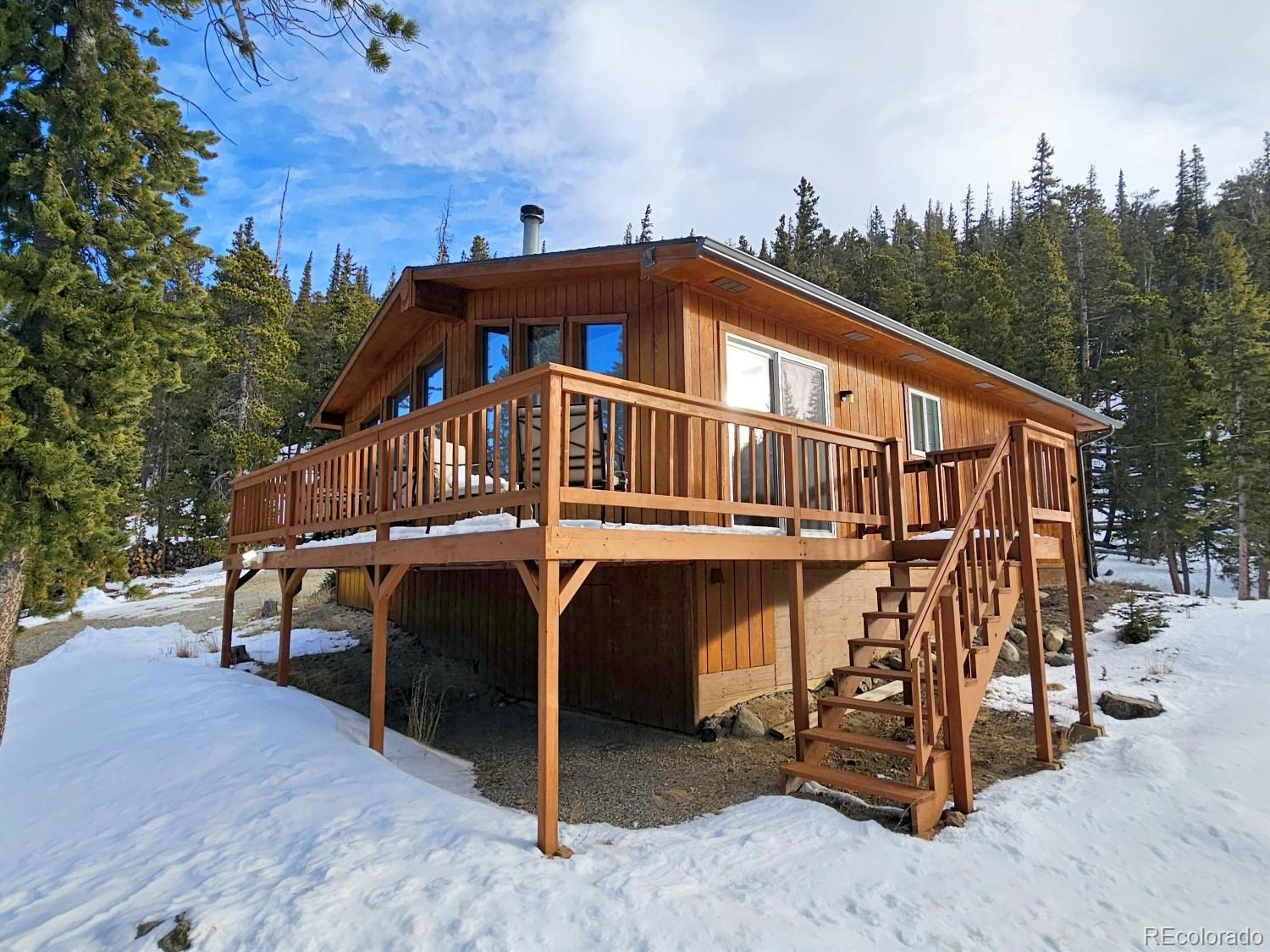 394 Co Road Fairplay, CO 80440 - Photo 11 of 46 a view of a house with a yard