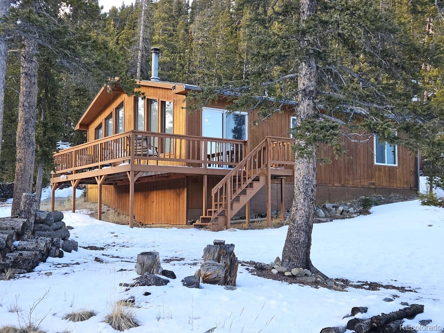 394 Co Road Fairplay, CO 80440 - Photo 17 of 46 a front view of a house with a yard