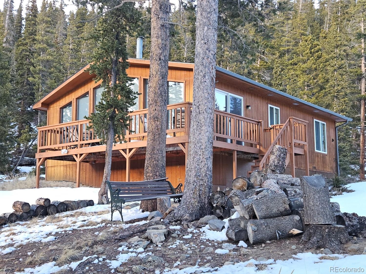 394 Co Road Fairplay, CO 80440 - Photo 18 of 46 a view of a large building with a bench in front of it