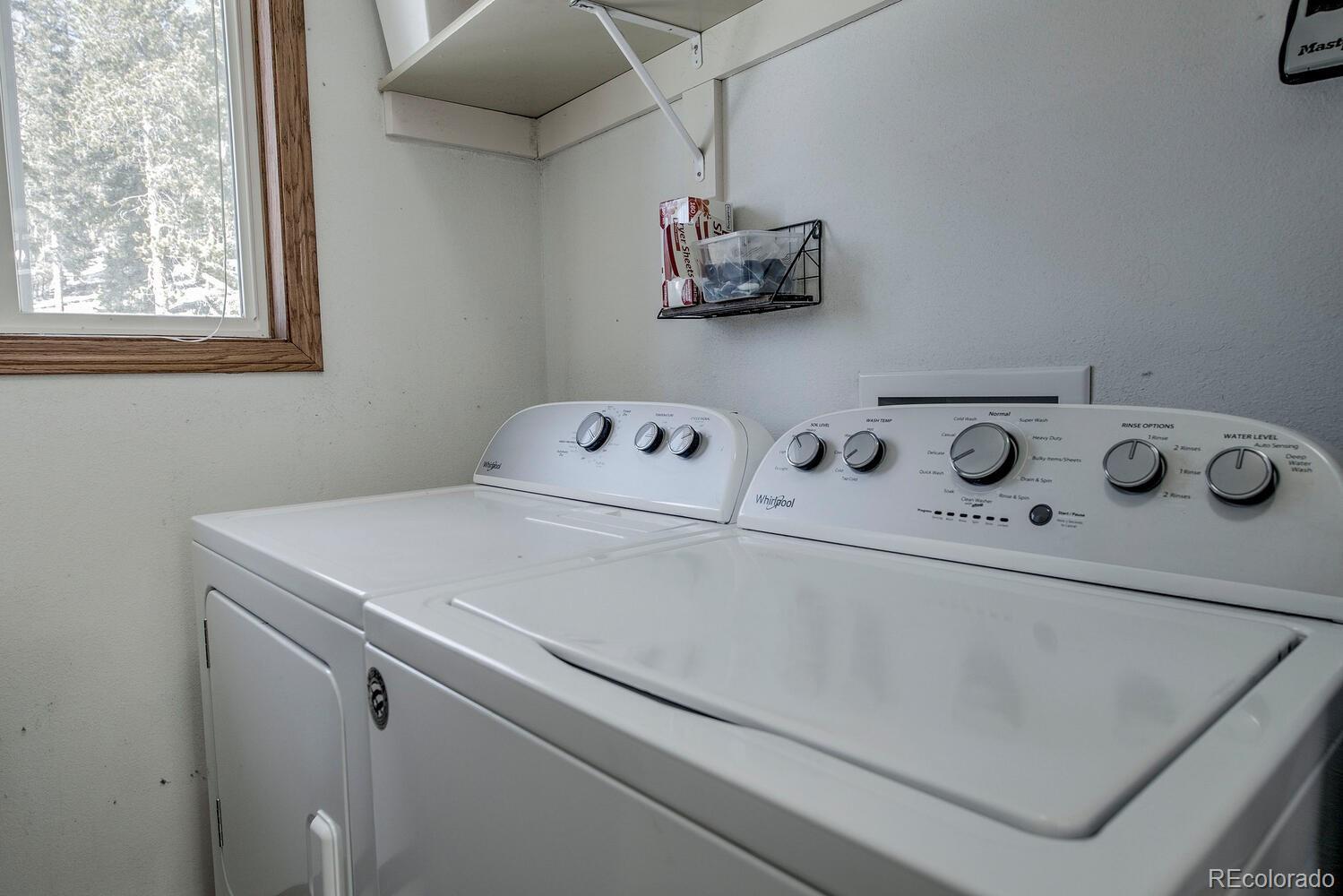 394 Co Road Fairplay, CO 80440 - Photo 34 of 46 a utility room with dryer and washer