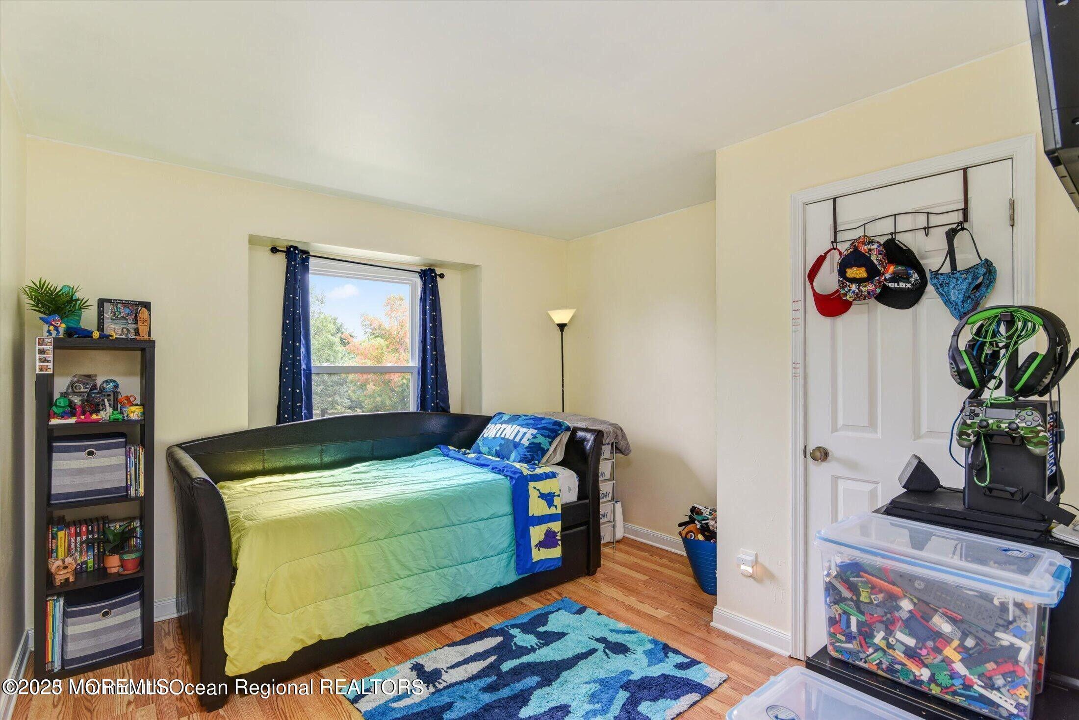 3 Albatross Drive Howell, NJ 07731 - Photo 12 of 16 a bedroom with a bed and furniture