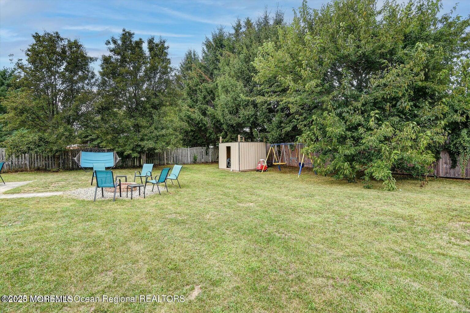 3 Albatross Drive Howell, NJ 07731 - Photo 15 of 16 a white building with a yard