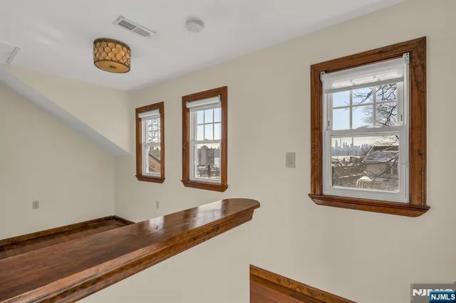 a view of livingroom with furniture and windows