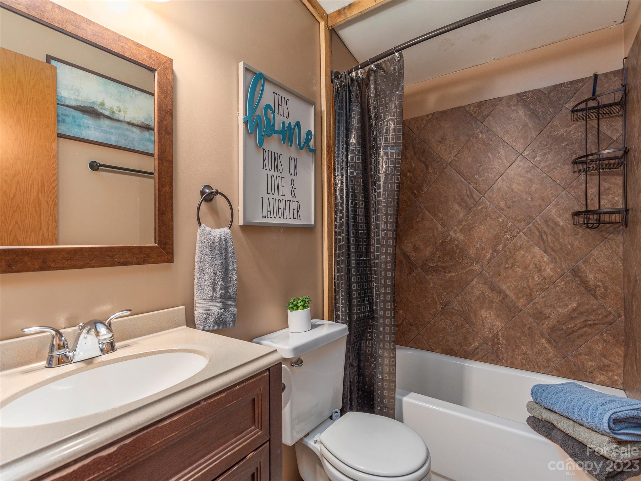 18 Autumn Mist Drive Fairview, NC 28730 - Photo 11 of 22 a bathroom with a sink toilet and shower