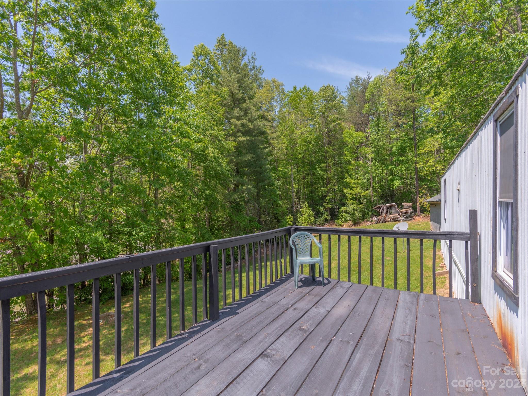 18 Autumn Mist Drive Fairview, NC 28730 - Photo 13 of 22 a balcony with wooden floor and fence