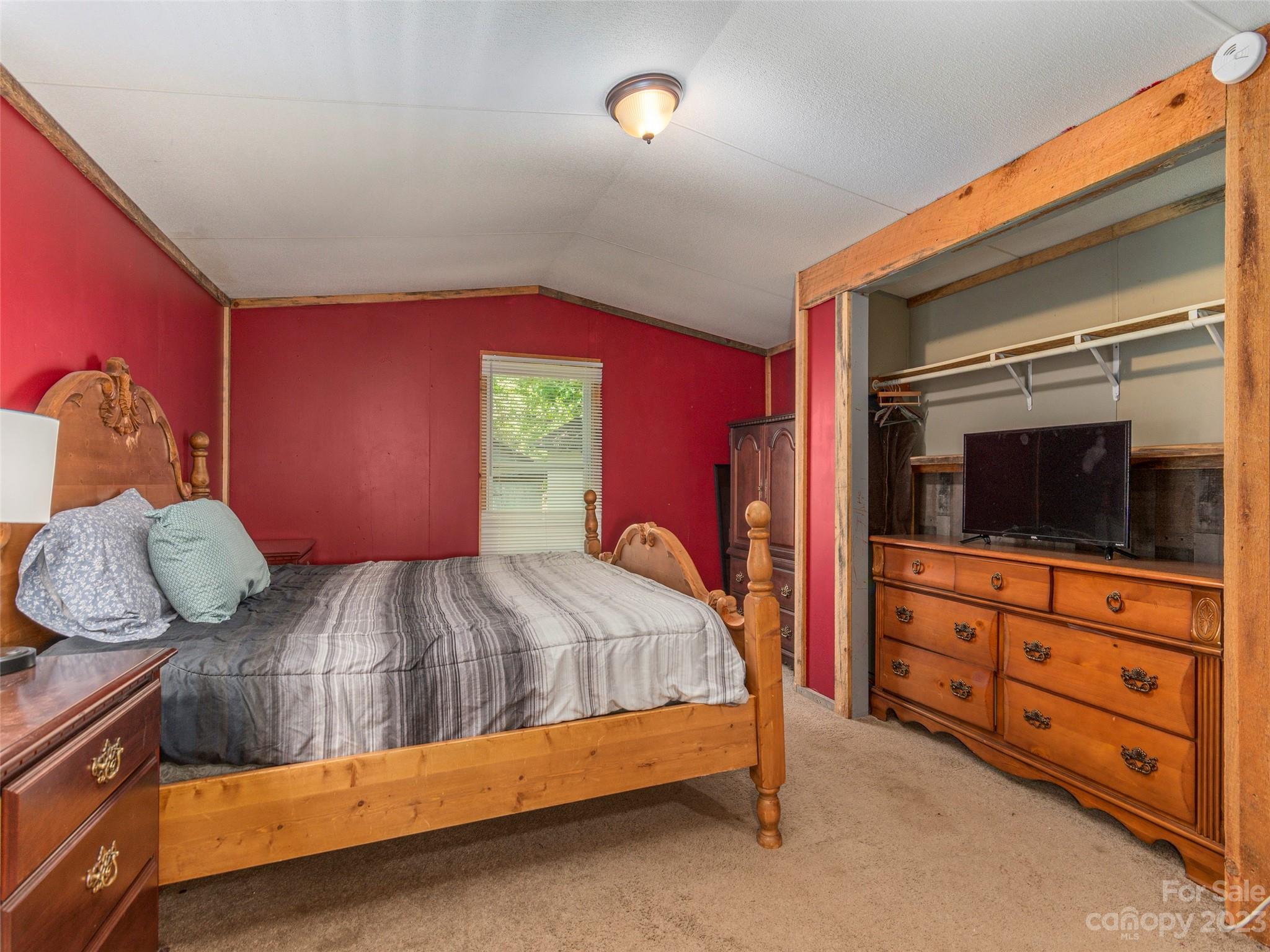 18 Autumn Mist Drive Fairview, NC 28730 - Photo 7 of 22 a bedroom with a bed and a dresser