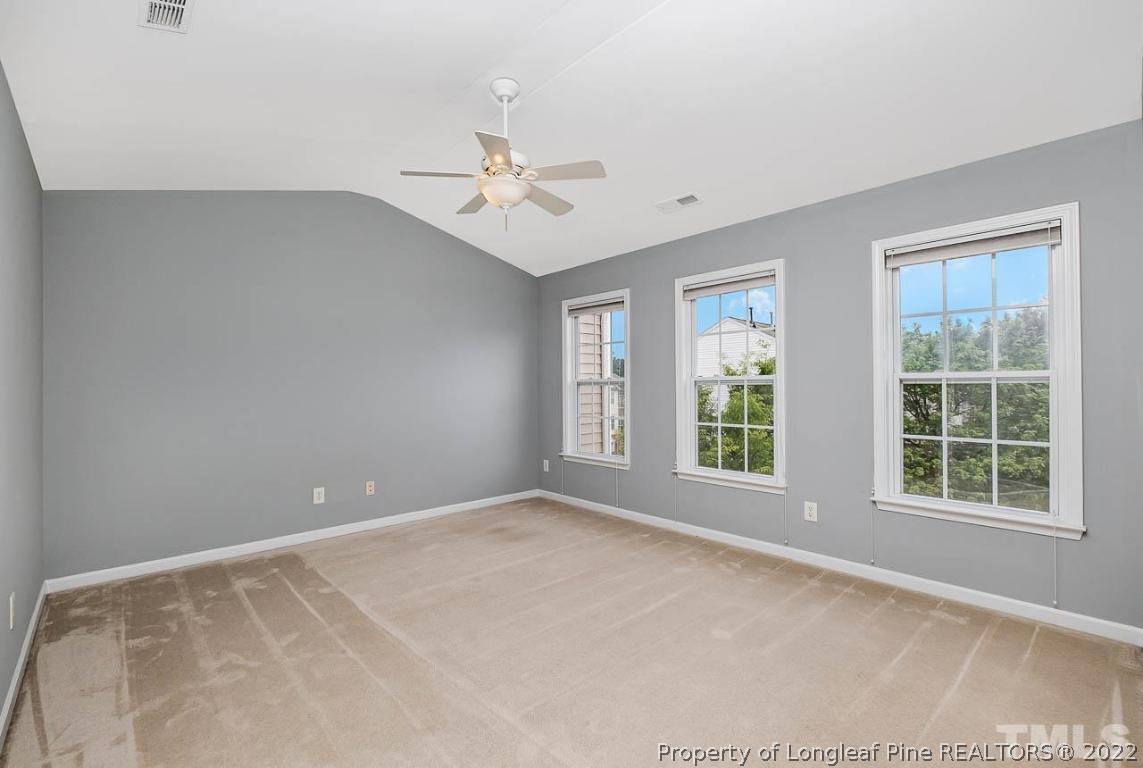 5441 Golden Arrow Lane Raleigh, NC 27613 - Photo 15 of 26 a view of an empty room with a window
