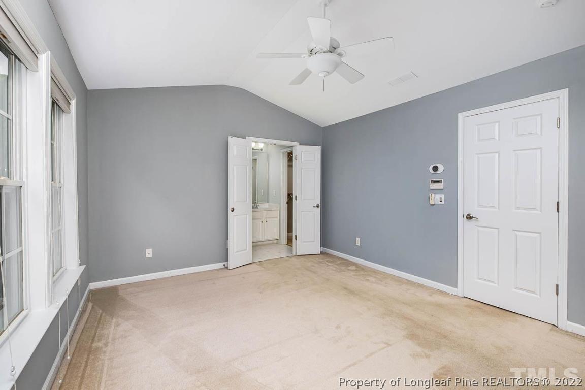 5441 Golden Arrow Lane Raleigh, NC 27613 - Photo 17 of 26 a view of an empty room with a window