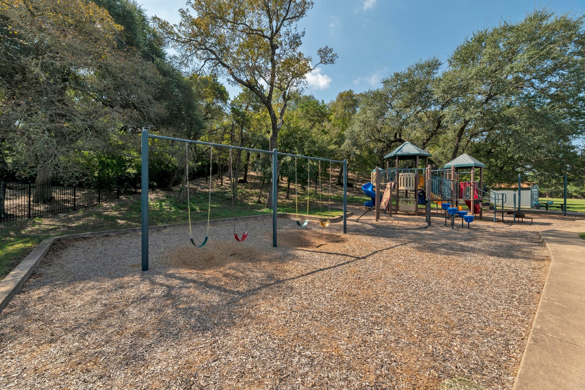 7204 Covered Bridge Drive Austin, TX 78736 - Photo 38 of 40 Community playground. New sport courts - pickleball, tennis, and basketball to be completed soon!
