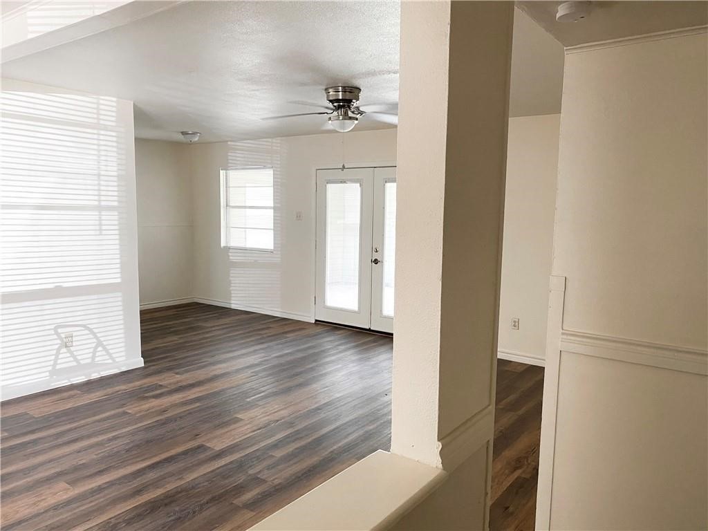 1728 Denver Street Portland, TX 78374 - Photo 2 of 15 a view of a room with wooden floor and window