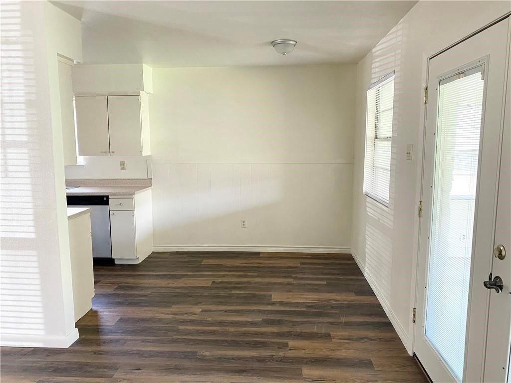 1728 Denver Street Portland, TX 78374 - Photo 5 of 15 a view of a room with wooden floor and staircase