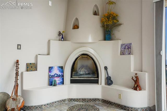 915 Oak Ridge Road Manitou Springs, CO 80829 - Photo 10 of 50 Kiva-style gas fireplace