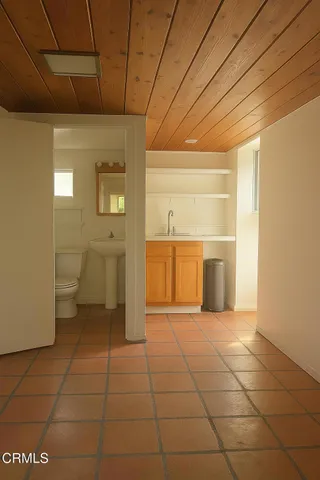 a view of a livingroom with a furniture